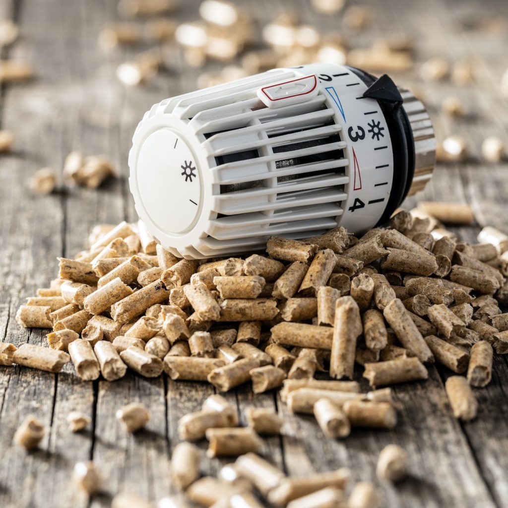 Wooden pellets and thermostatic head.